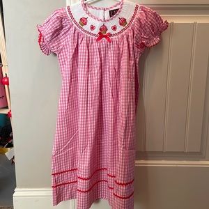 Lil Cactus pink gingham birthday dress with smocked cupcakes.